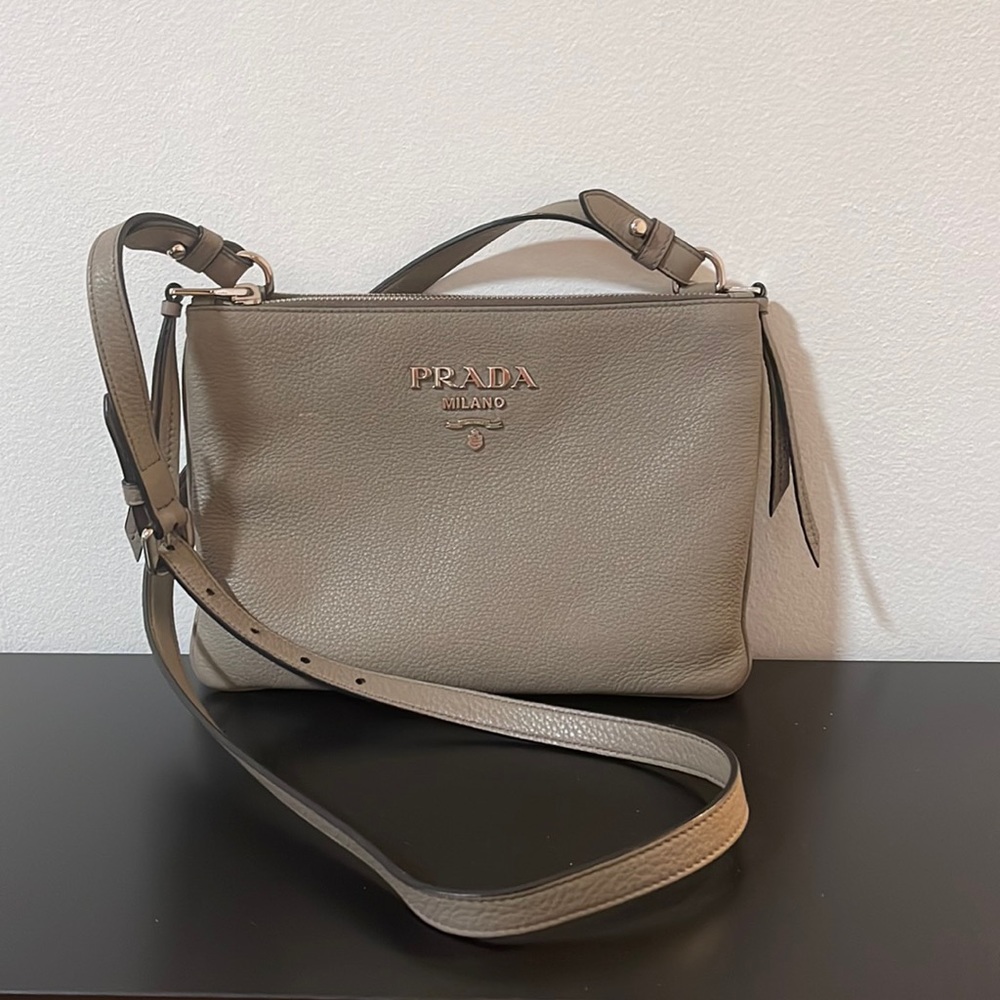 PRADA
Vitello Phenix Double Zip Crossbody Bag Baltico